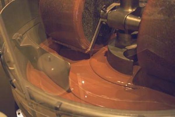 Cocoa beans being ground