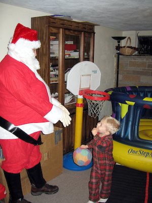 Santa and Tim playing ball (12-03-2005 17:56)