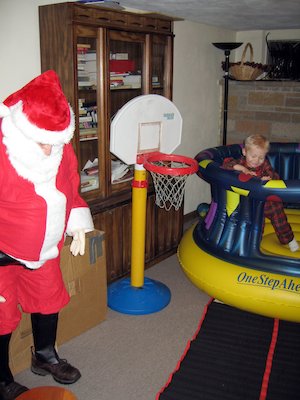 Santa and Tim playing ball (12-03-2005 17:56)