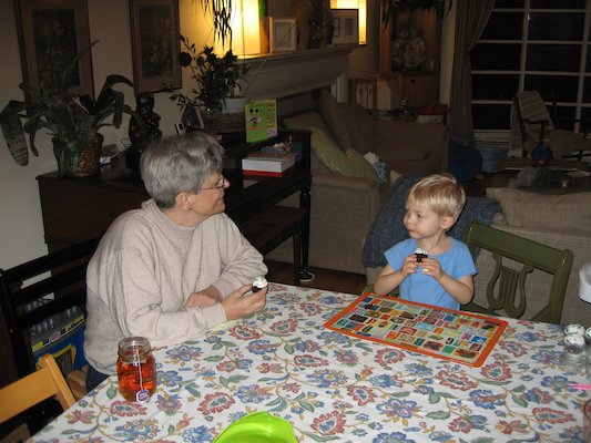 Nea and Tim eating cake (03-01-2006 19:28)