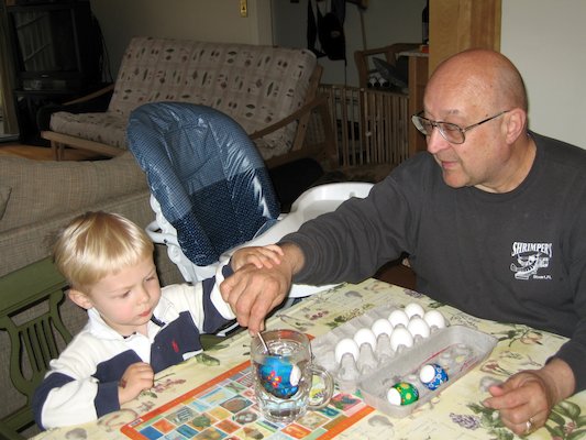 Tim, Cole and Poppy making Easter eggs (04-14-2006 18:01)