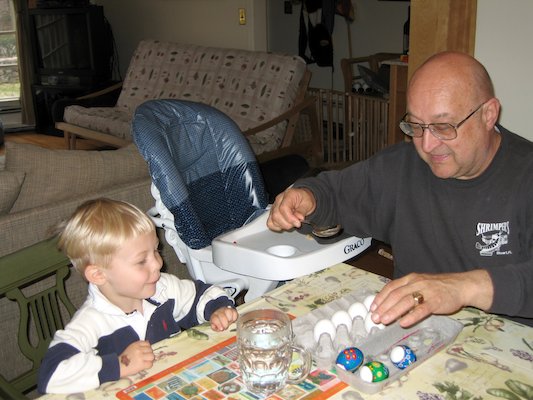 Tim, Cole and Poppy making Easter eggs (04-14-2006 18:01)