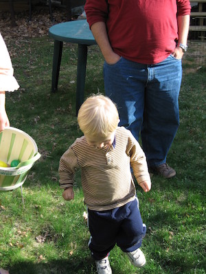 Tim hunting eggs at our house (04-15-2006 18:15)