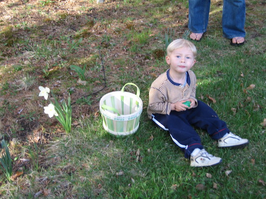 Tim hunting eggs at our house (04-15-2006 18:16)