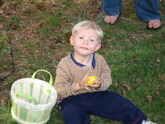 Tim hunting eggs at our house (04-15-2006 18:16)