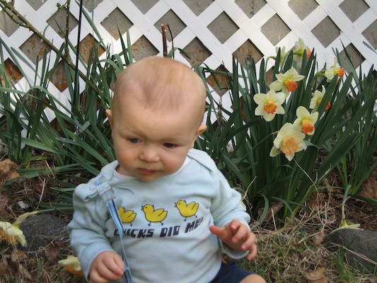 Cole by the flowers (04-15-2006 18:32)