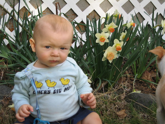 Cole by the flowers (04-15-2006 18:32)