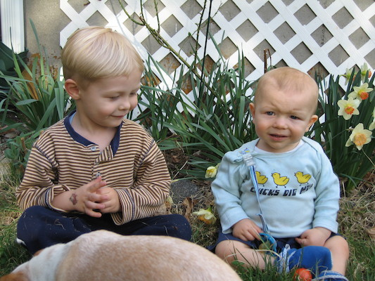Tim, Cole and Emily by the flowers (04-15-2006 18:34)