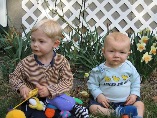 Tim and Cole by the flowers (04-15-2006 18:34)