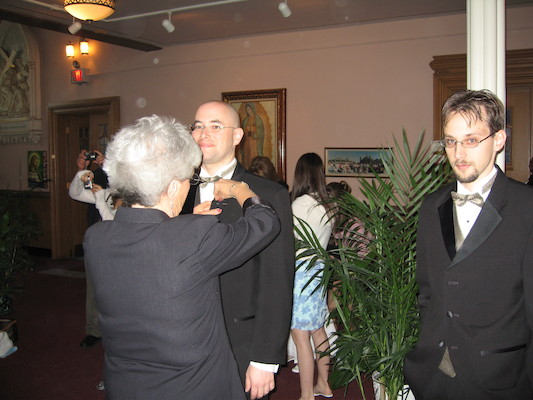 Groomsmen being buttoniered (04-29-2006 18:33)