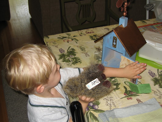 Tim putting Prickle into his house (05-31-2006 17:32)