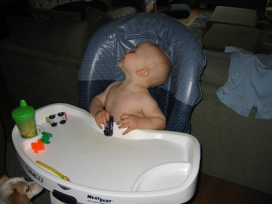 Cole watching for his cake (06-16-2006)