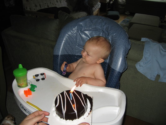 Cole and his birthday cake (06-16-2006)