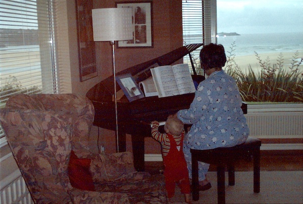 Cole and Donna playing the piano