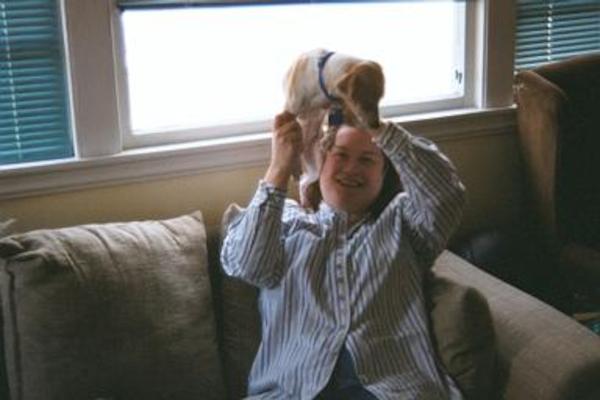 Xine wearing an Emily hat