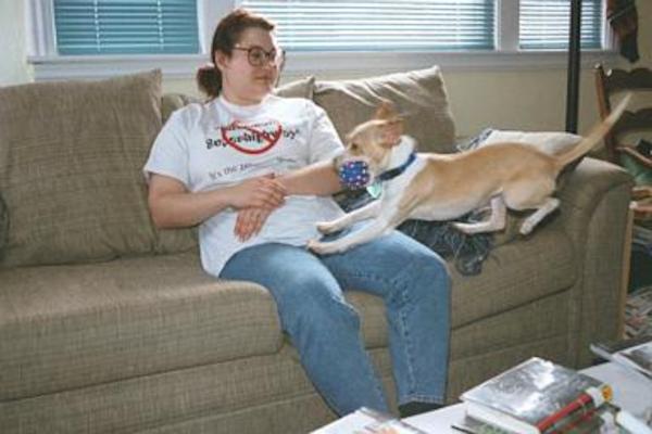 Emily jumping over the girl with her ball