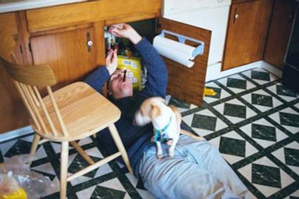 Emily helping the boy plumb