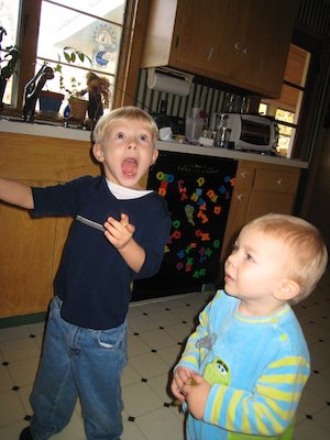 Tim and Cole watching the mixer (12-02-2006 14:17)