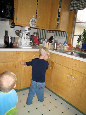 Tim and Cole watching the mixer (12-02-2006 14:17)