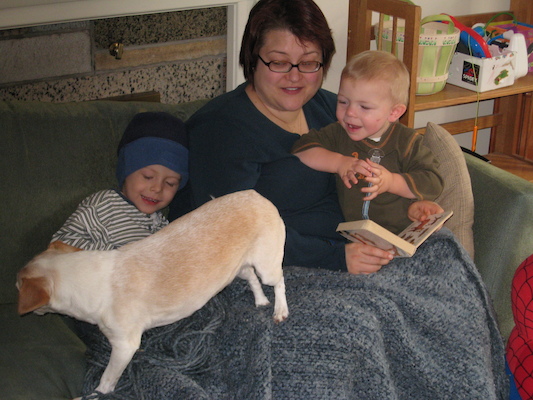 Mommy, Cole and Tim reading with Emily leaving (12-09-2006 12:38)