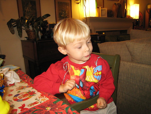 Tim eating in his new Spiderman shirt (12-24-2006 17:24)