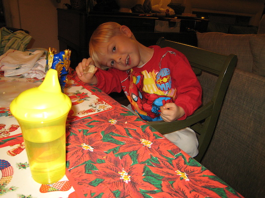 Tim eating in his new Spiderman shirt (12-24-2006 17:25)