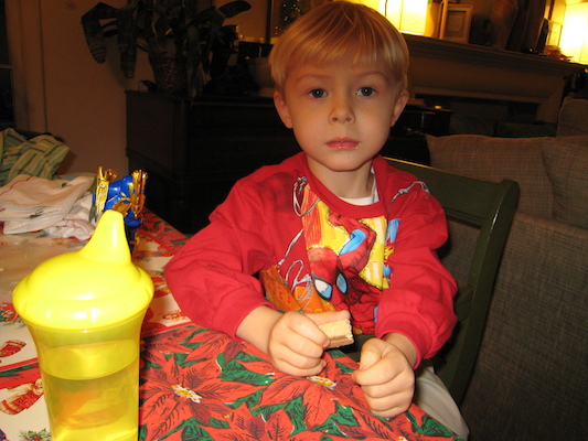 Tim eating in his new Spiderman shirt (12-24-2006 17:26)