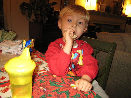 Tim eating in his new Spiderman shirt (12-24-2006 17:26)
