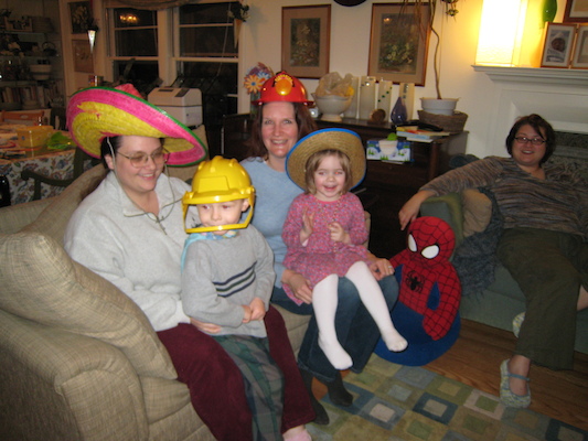 Helene, Barb, Tim and Emma in silly hats (01-28-2007 18:53)