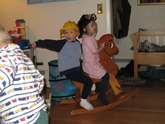 Tim and Emma horseriding together, pointing at Cole (02-04-2007 17:16)
