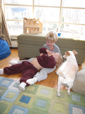 Tim and Cole cuddling, with Emily (04-01-2007 09:26)