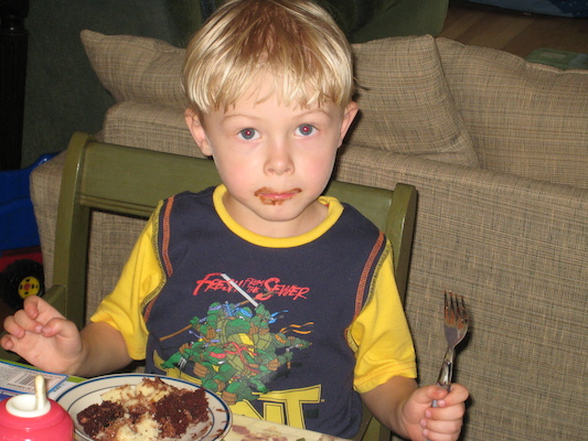 Tim vs. the cake (05-24-2007 18:05)