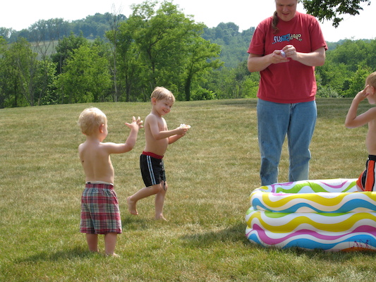 Cole, Tim, Ben and Tate refilling (06-13-2007 16:08)