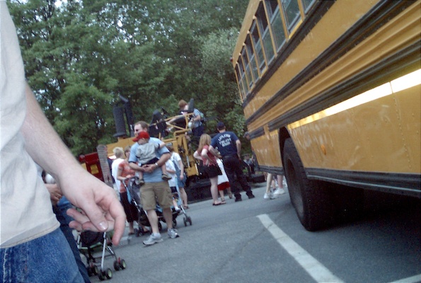 Daddy next to the school bus