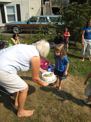 Linnea blowing out her candles (10-06-2007 13:40)