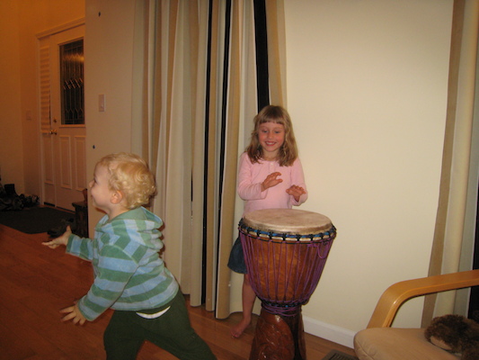 Cole dancing, Linnea drumming (10-13-2007 19:47)