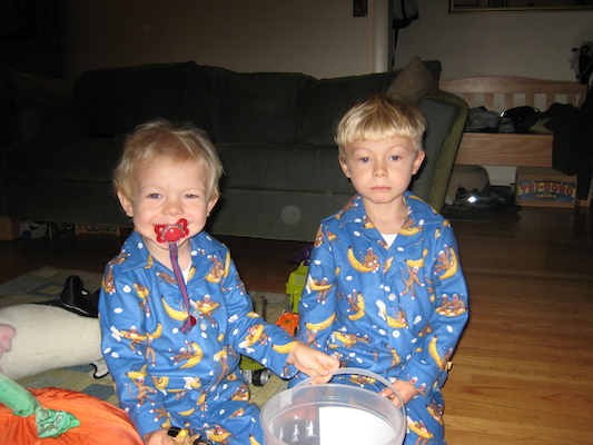 Cole and Tim in monkey jammies (10-15-2007 07:52)