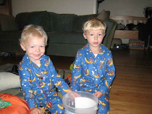 Cole and Tim in monkey jammies (10-15-2007 07:52)