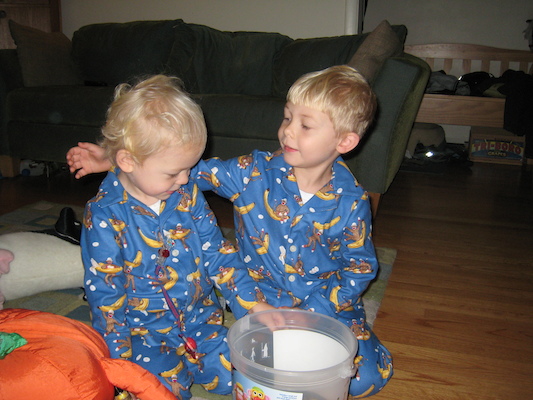 Cole and Tim in monkey jammies (10-15-2007 07:53)