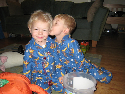 Cole and Tim in monkey jammies (10-15-2007 07:53)