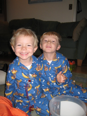 Cole and Tim in monkey jammies (10-15-2007 07:53)