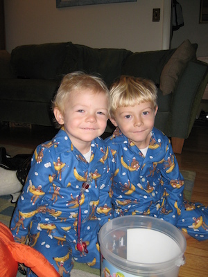 Cole and Tim in monkey jammies (10-15-2007 07:53)
