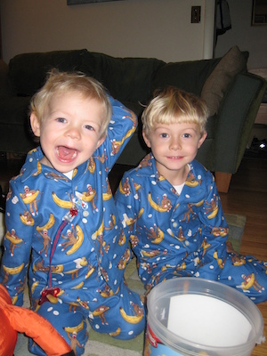 Cole and Tim in monkey jammies (10-15-2007 07:53)