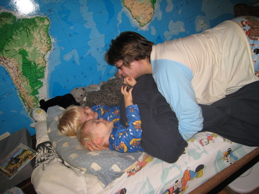 Cole, Tim and Christine in monkey jammies (10-17-2007 20:15)