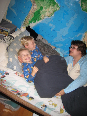 Cole, Tim and Christine in monkey jammies (10-17-2007 20:15)