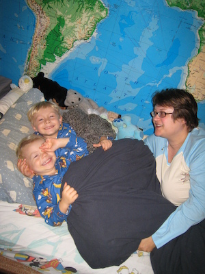 Cole, Tim and Christine in monkey jammies (10-17-2007 20:15)