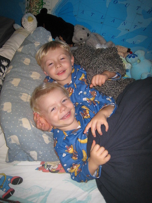 Cole and Tim in monkey jammies (10-17-2007 20:15)