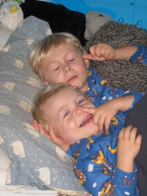 Cole and Tim in monkey jammies (10-17-2007 20:15)