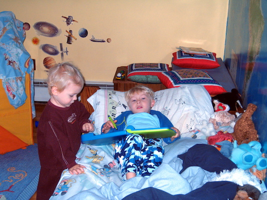 Cole helping Tim read (11-11-2007 09:25)