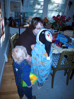 Christine kissing caped Tim and Cole (11-14-2007 07:59)